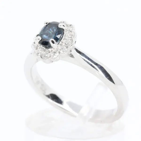 Oval Shape Australian Sapphire Ring with Grain of Diamonds Set in 18ct White Gold