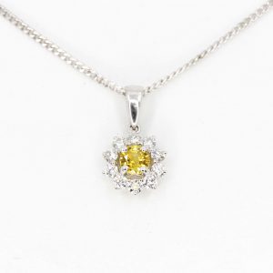 Yellow Sapphire Pendant with Diamond accents set in 18ct White Gold