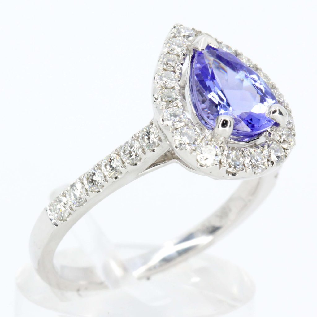 Pear Cut Tanzanite Ring With Accents Of Diamonds Set In 18ct White Gold