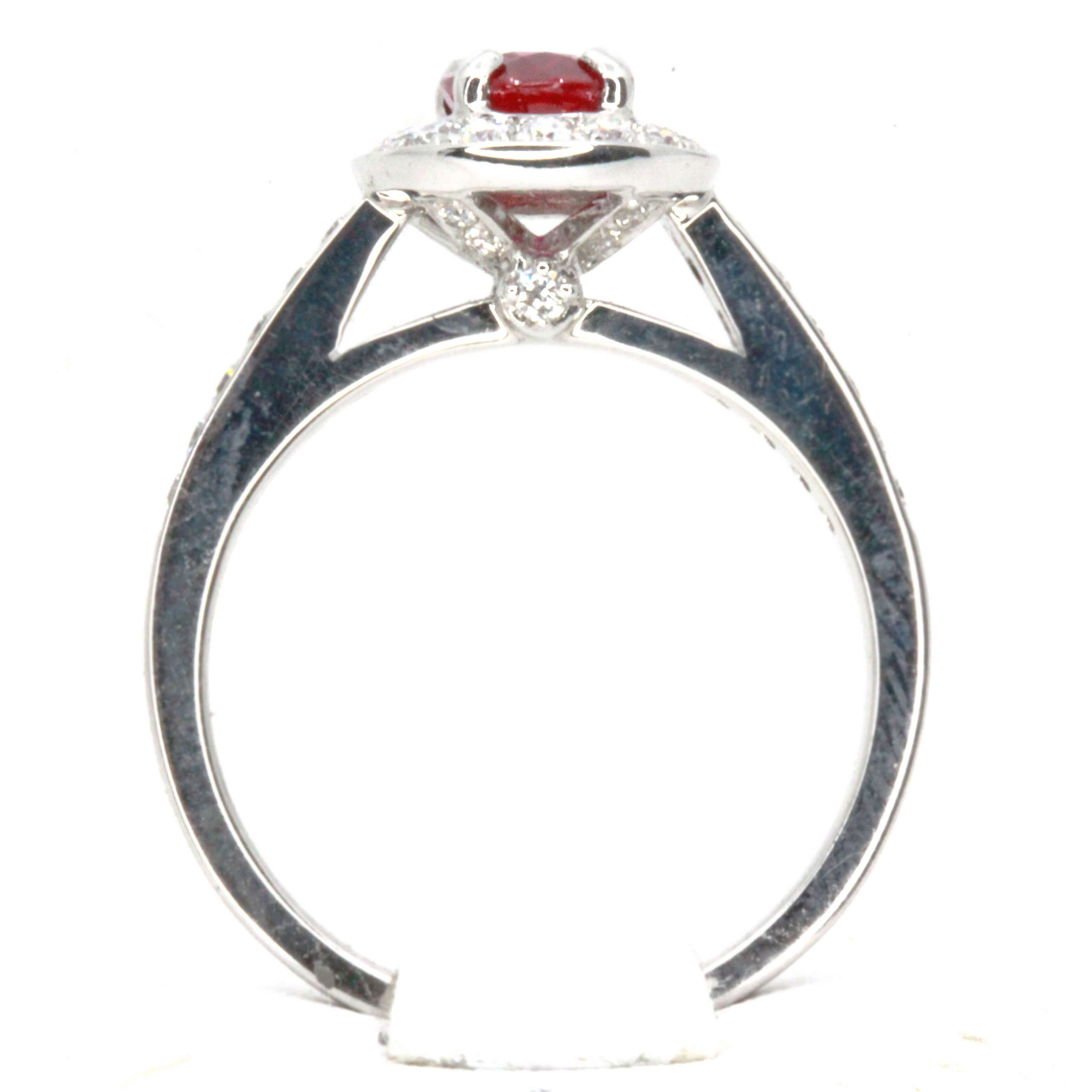 Oval Cut Ruby Ring with Accents of Diamonds Set in 18ct White Gold