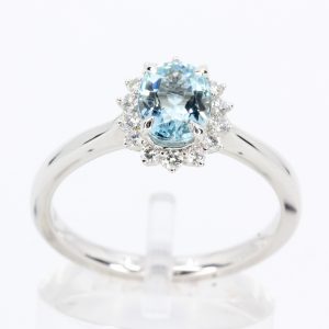 round cut emerald diamond ring